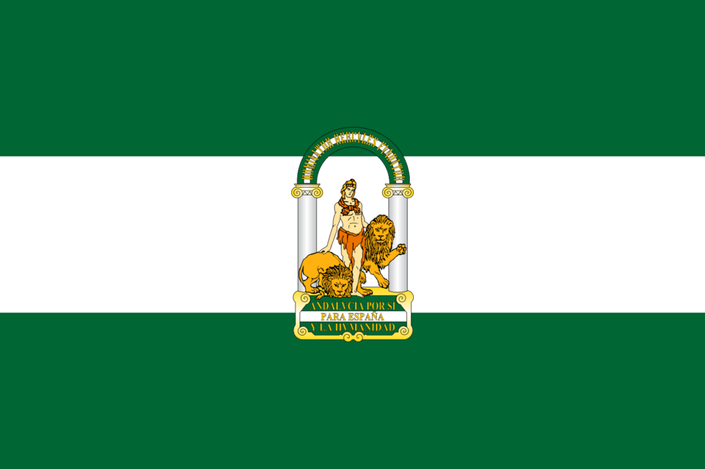 La bandera de Andalucía está formada por tres franjas horizontales, dos verdes y una blanca. En el centro está el escudo. 